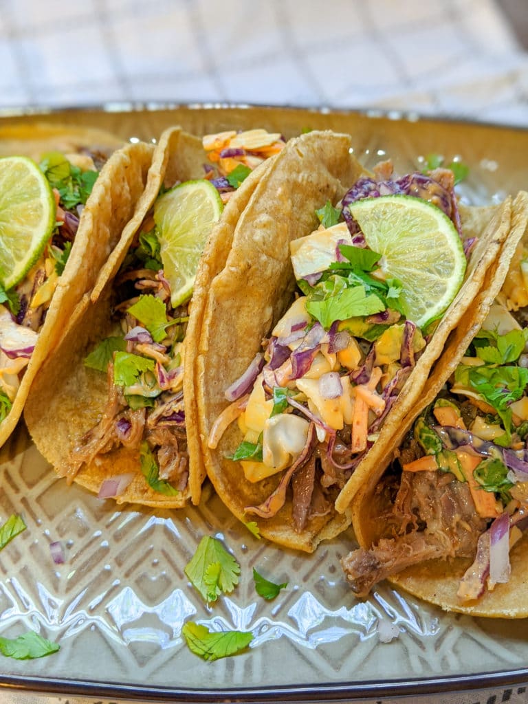 Pork Carnitas tacos on a platter