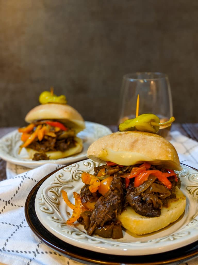 Italian beef sandwiches on a white plate