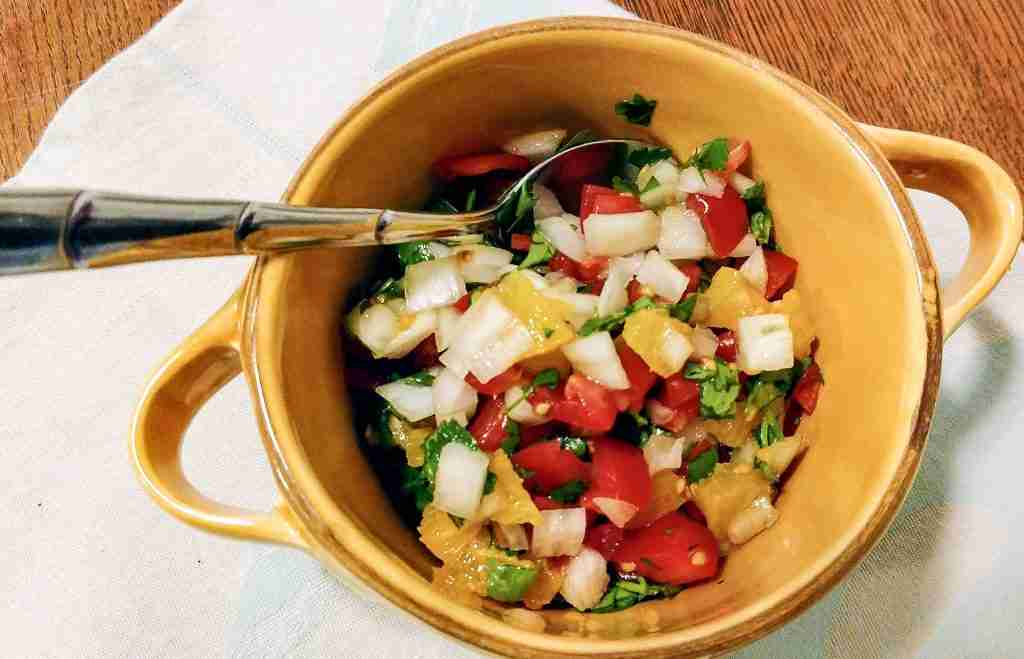 Orange Pico de Gallo in a yellow bowl