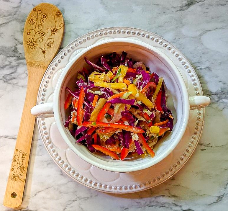 A bowl of food sitting on a table