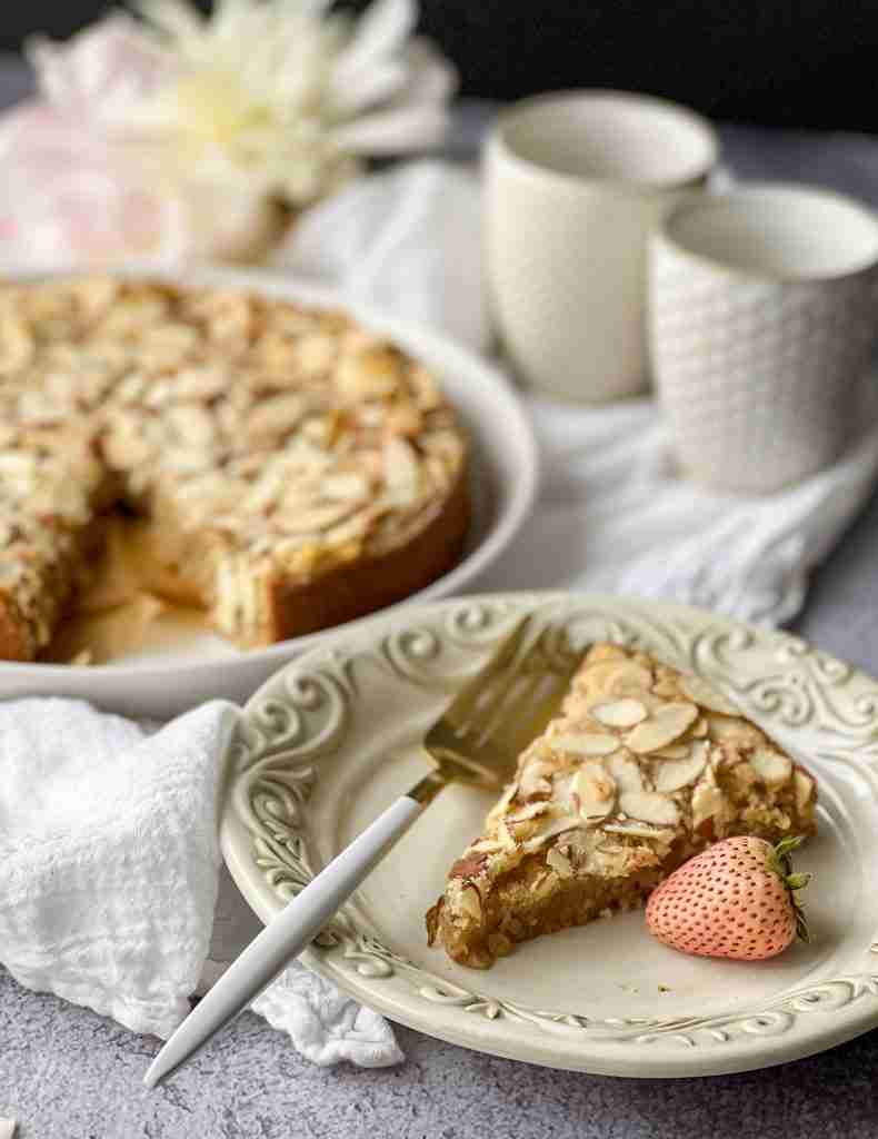 Almond Cake with a slice on a plate