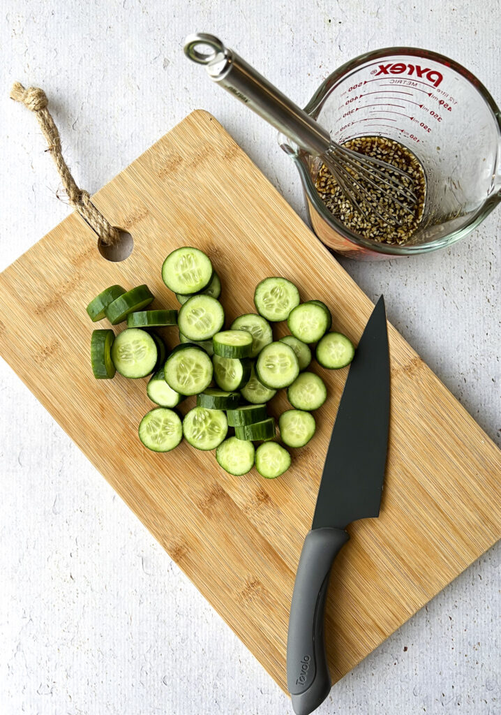 cucumber slices on a bamboo cutting board